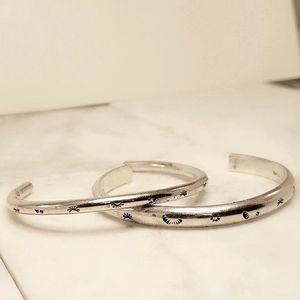 Two Vintage Stamped Sterling Bangles